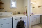 Laundry room with full washer and dryer 